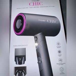 Blow dryer still in box. Never used. Brand new